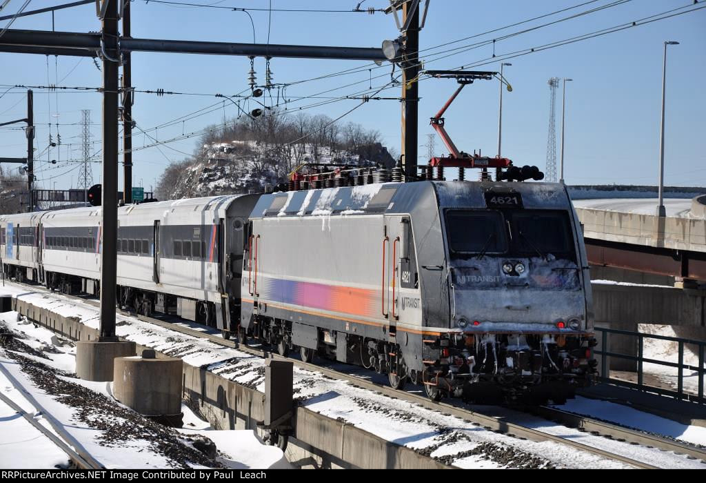 Westbound commuter shoves out of the station